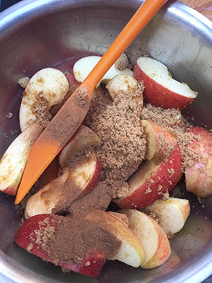 Toss the apples in the lime juice and then the sugar and cinnamon. Toss the apples in the lime juice and then the sugar and cinnamon.
