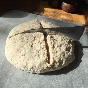Score into quarters and dust liberally with flour before baking. step by step soda bread